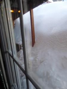 Snow piled up at our window